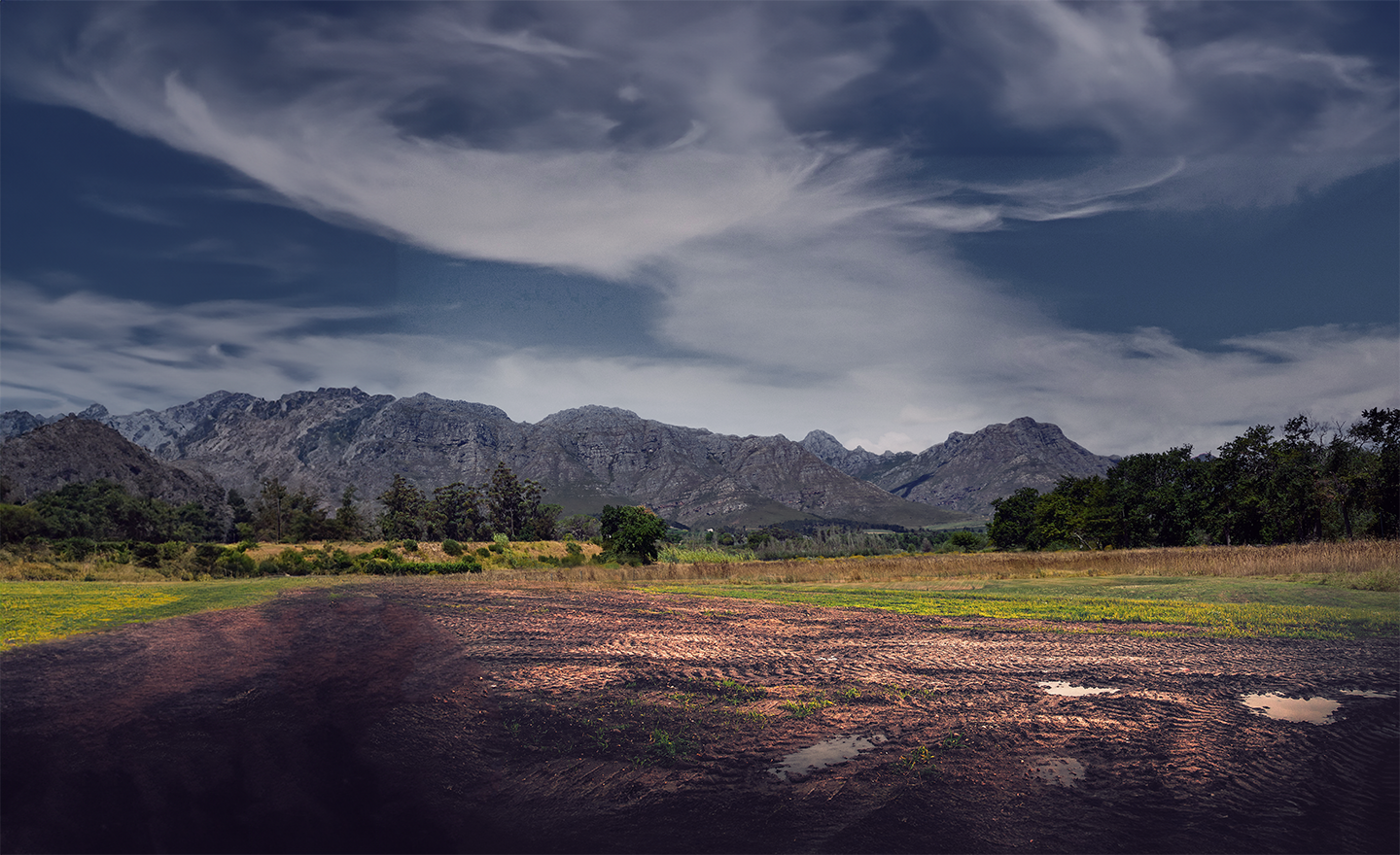Mountain range with a blue sky.
